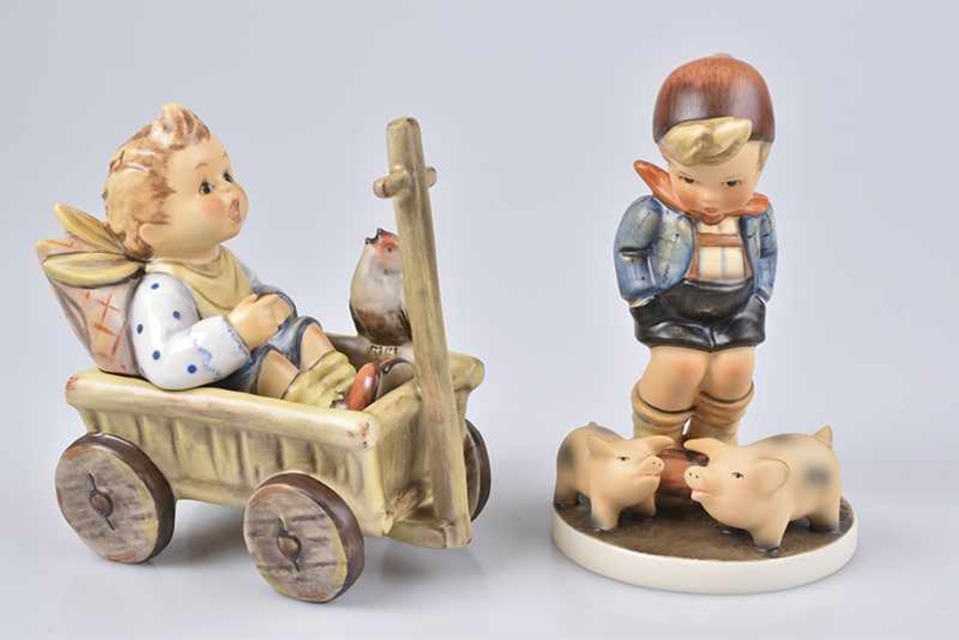 GOEBEL/ HUMMEL 2 Figuren 'Schweinhirt - Farm Boy' + 'Was frag' ich viel nach Geld und Gut... - I'm