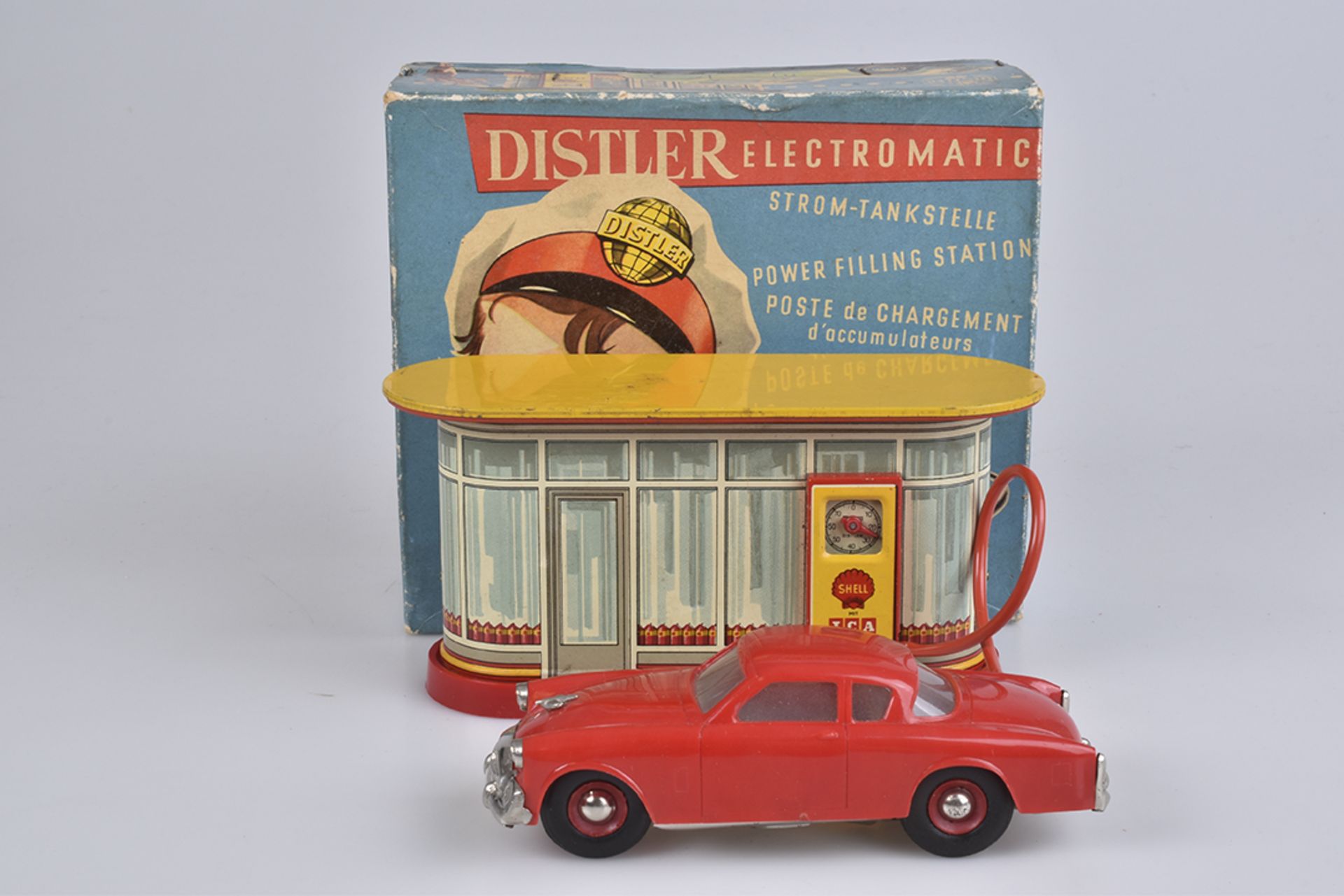 DISTLER Electromatic Strom-TankstelleBlech, lithografiert, 60er Jahre, mit Studebaker Auto, Shell