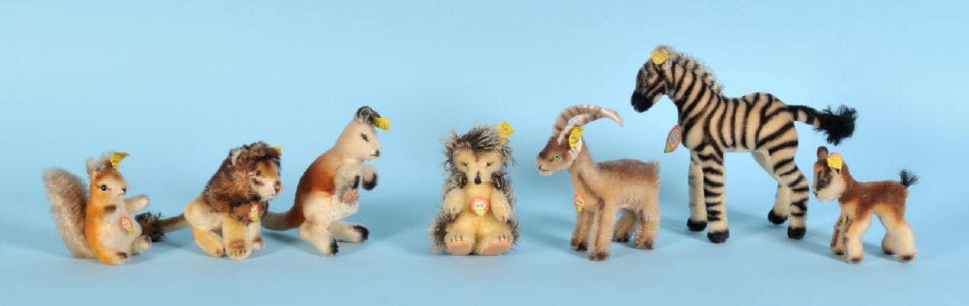 Steiff-Plüschtiere, 7 StückGlasaugen, H= 10-21 cm, Kangoo, Rocky, Leo, Possy, Joggi, Zebra,