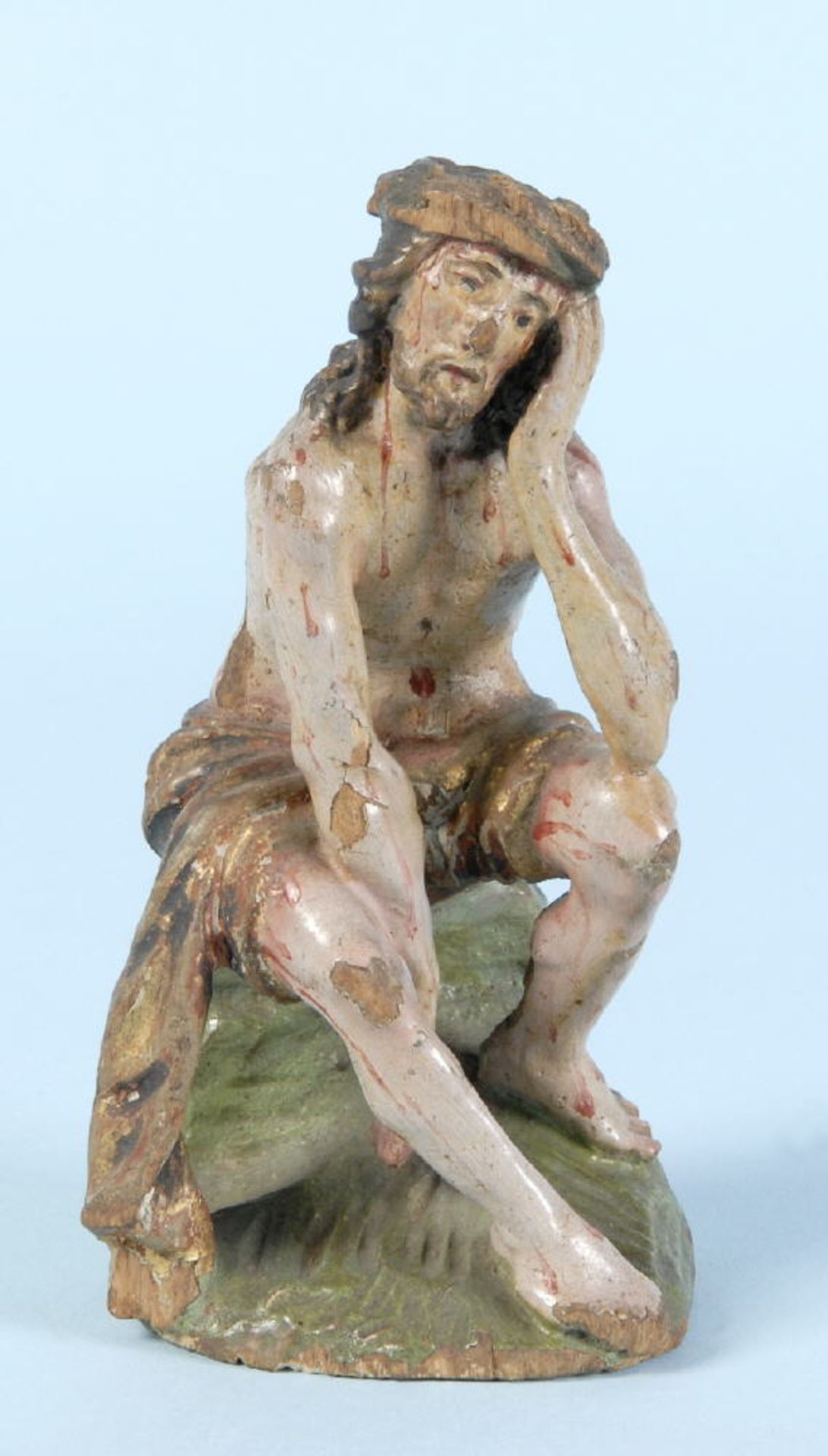 Christus in der RuhHolz, farbig gefasst, auf Sockel, H= 12,5 cm, leicht besch.Christus in der