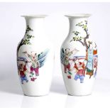 A pair of Chinese porcelain vases, depicting young boys. Republic period