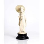 an antique, bone sculpture, beautifully carved woman