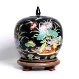 Chinese familnoiare jar, depicting ducks and lotus flowers. Late Qing dynasty.