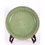 Ming dyn. Celadon Longquan porcelan charger, depicting kylin