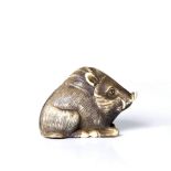 , Japanese, bone or antler netsuke, depicting a wild boar.