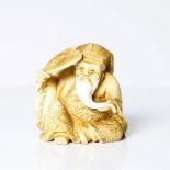 an antique, Japanese, antler or bone netsuke. 1920-30s