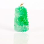 a fine, antique, Chinese jadeite pendant with gold ring,