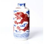 Chinese, blue and red snuff bottle, depicting 2 dragons. 19th cent.