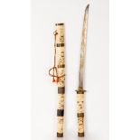 Japanese Samurai sword. sheath carved from bone- circa 1950 úøùåí òöí