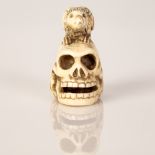 Old Japanese Bone Netsuke Bird on a Skull