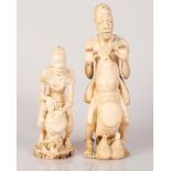 Pair of African Bone Sculptures Drum Players Figure