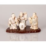 old signed Chinese bone sculpture of group drinking tea