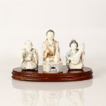 old Chinese bone sculpture of friends drinking saki or tea