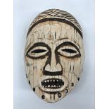 African Tribal Ornamental Bone Mask Figure of a Man, 19th Century