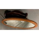 Magazine rack and oval mirror