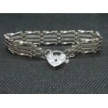 Vintage silver 4 bar bracelet with lock and chain London 1976 14g