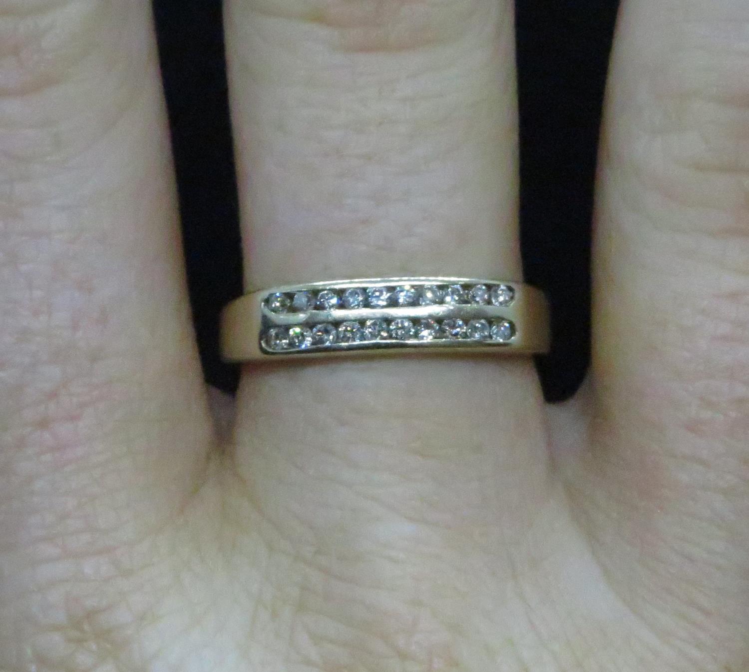 18ct gold double row eternity ring set with 20 brilliant cut diamonds
