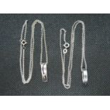 2x silver pendants set with small natural diamond 8g