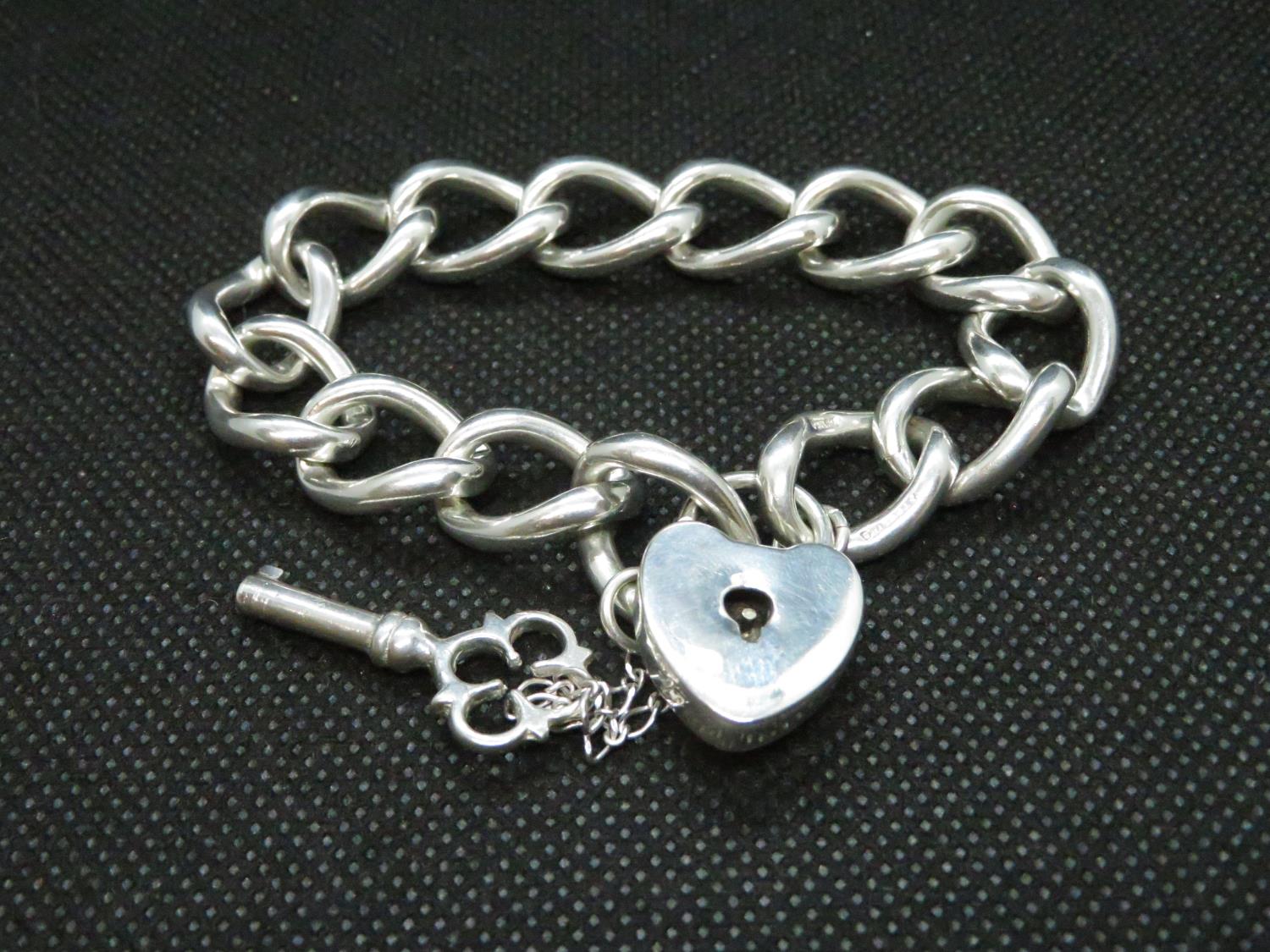 Silver bracelet with key and padlock 31g