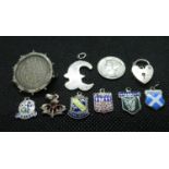 Collection of silver charms and locks 23.5g