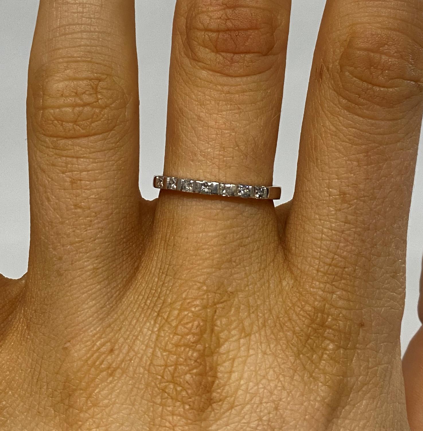 18ct white gold 7 stone princess cut diamond eternity ring fully HM and stamped .25 carat