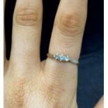 Lady's 9ct platinum set ring with three stones
