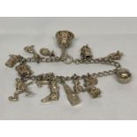 Vintage silver charm bracelet with 15 charms
