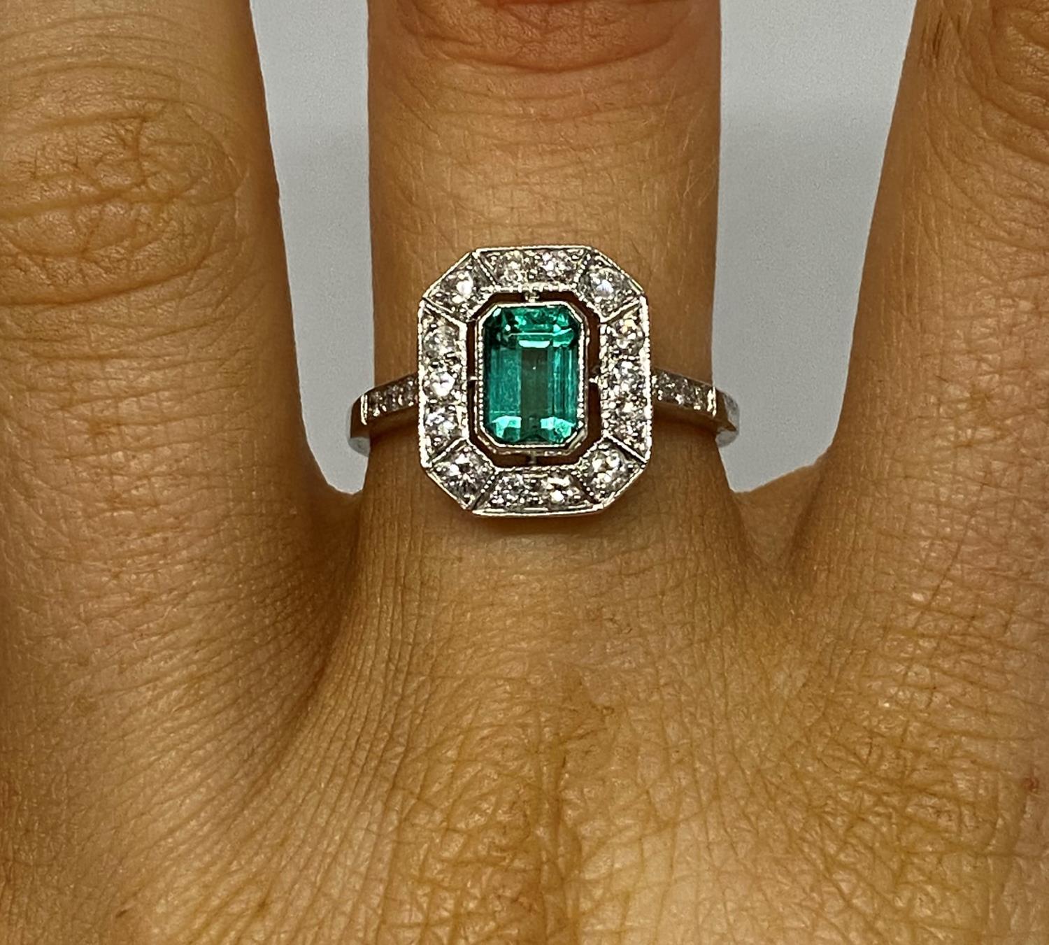 Art Deco platinum emerald and diamond cluster ring