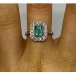 Art Deco platinum emerald and diamond cluster ring
