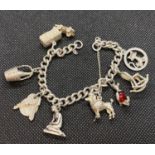 Silver charm bracelet 44.7g