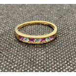9ct gold half hoop eternity ring set with amethyst and blue topaz