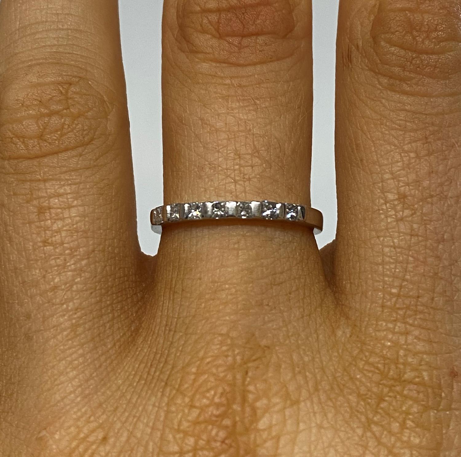 18ct white gold 7 stone princess cut diamond eternity ring fully HM and stamped .25 carat - Image 2 of 3