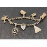 Vintage silver charm bracelet with 6 charms London 1978 37.5g