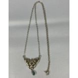 Vintage silver celtic design necklace with blue topaz stone