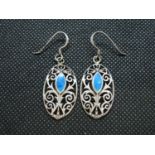 Pair of silver earrings