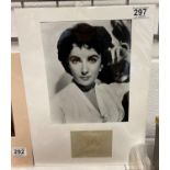 Elizabeth Taylor signed album page together with B?W photo