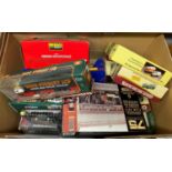 Box containing corgi Eddie Stobart trucks and other cars