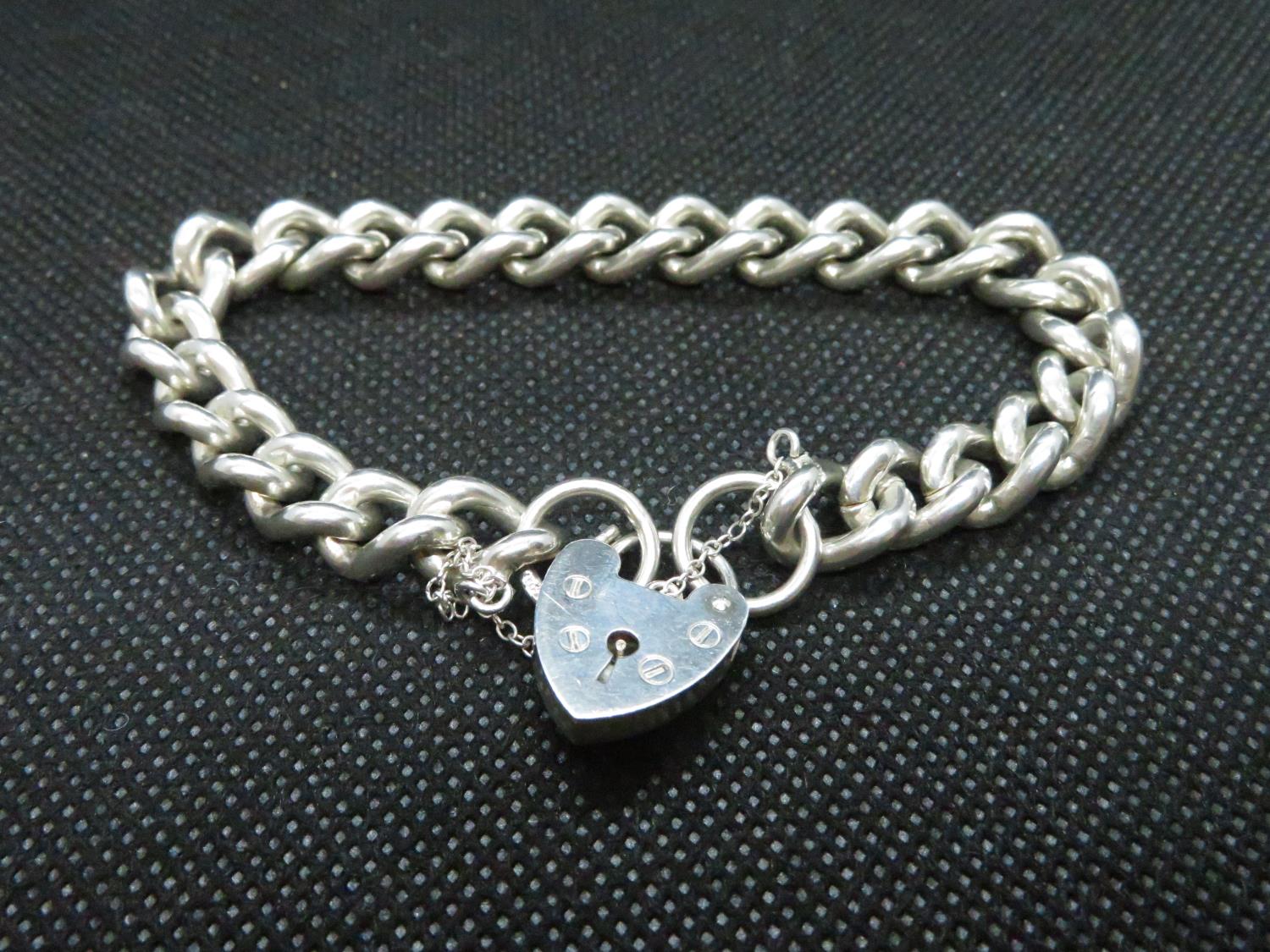 Solid silver curb link bracelet with lock and chain fully HM London 1979 39g