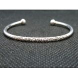 Solid silver diamond cut Torc bangle HM London 1991 11g