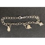 Silver charm bracelet with 3 charms 10g