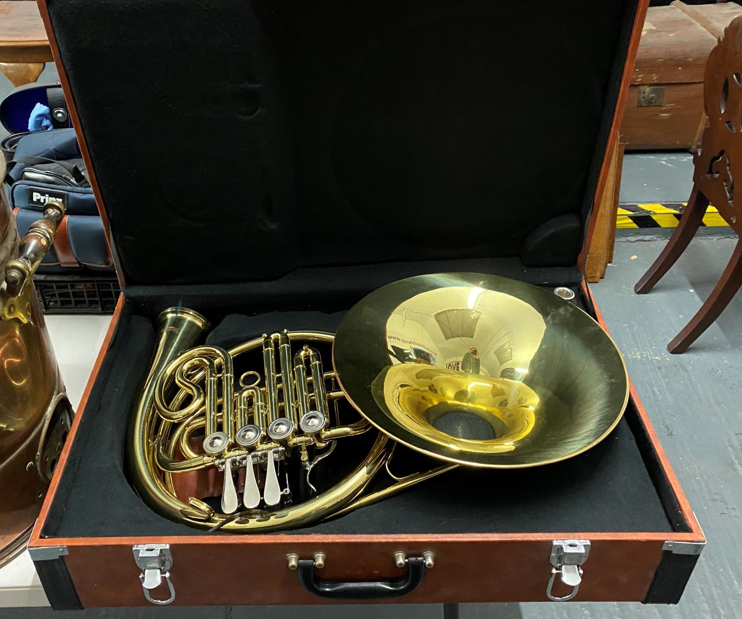 Case containing Ventiano french horn