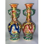 2x Japanese fully marked to base vases both with a five toed dragon, one pink and one blue - pink