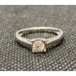 Quarter carat diamond set in 9ct white gold setting ring