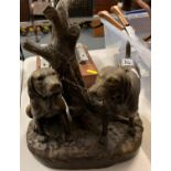 Heavy bronze hunting dogs singed by Johnson