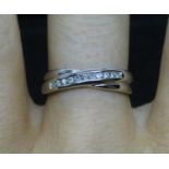 18ct white gold and diamond crossover ring