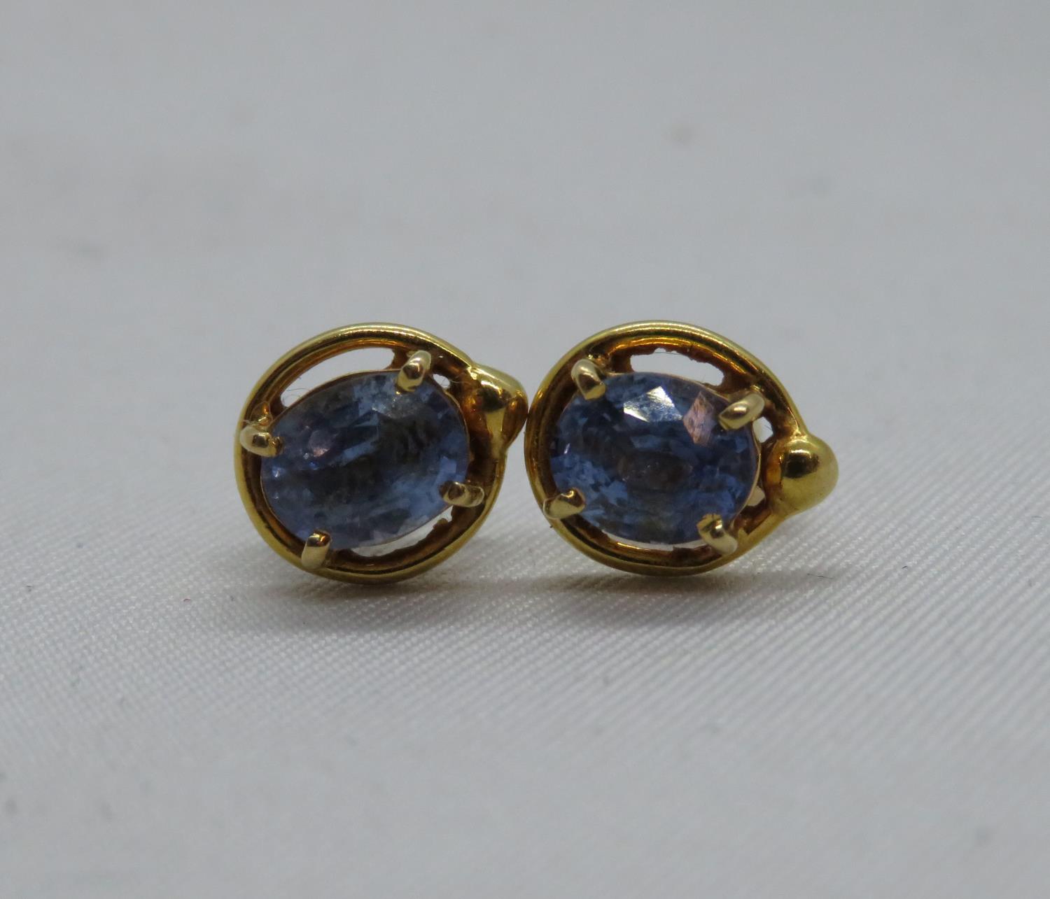 2x high grade yellow gold earrings with brilliant cut .5carat (per ear) sapphires