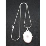 Sterling silver locket on 18" serpentine link chain