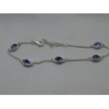 Silver bracelet set with blue stones 8" 3.5g
