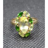 9ct ring size Q with yellow and green stones 3g