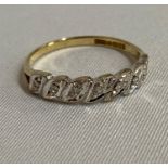 9ct gold ring set with 7 natural diamonds fully HM 1.2g